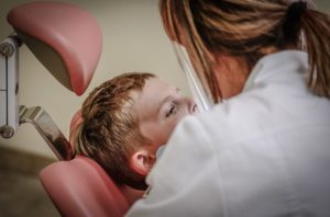 child in a dental chair