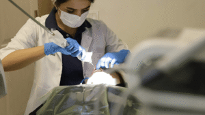 dentist viewing patient with light